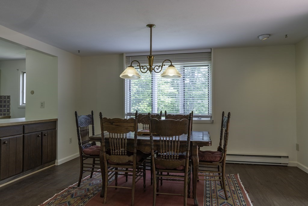 735 North Poland Road Conway, MA 01341 - Photo 5 of 40 a view of a dining room with furniture window and wooden floor
