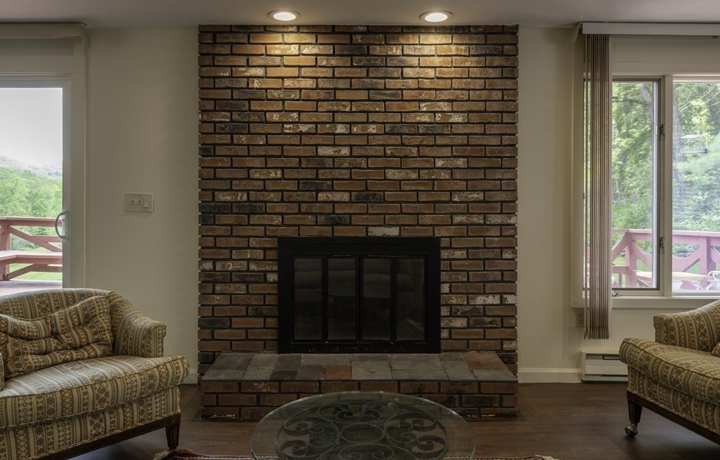 735 North Poland Road Conway, MA 01341 - Photo 7 of 40 a living room with furniture and a fireplace