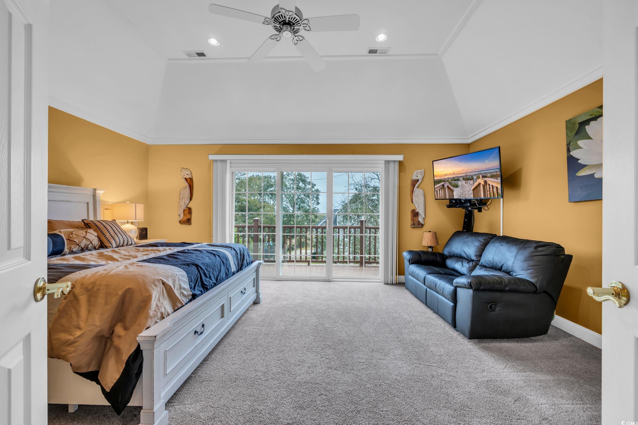 830 Channel Cat Cove Murrells Inlet, SC 29576 - Photo 23 of 40 Bedroom with lofted ceiling, access to outside, ornamental molding, carpet flooring, and ceiling fan