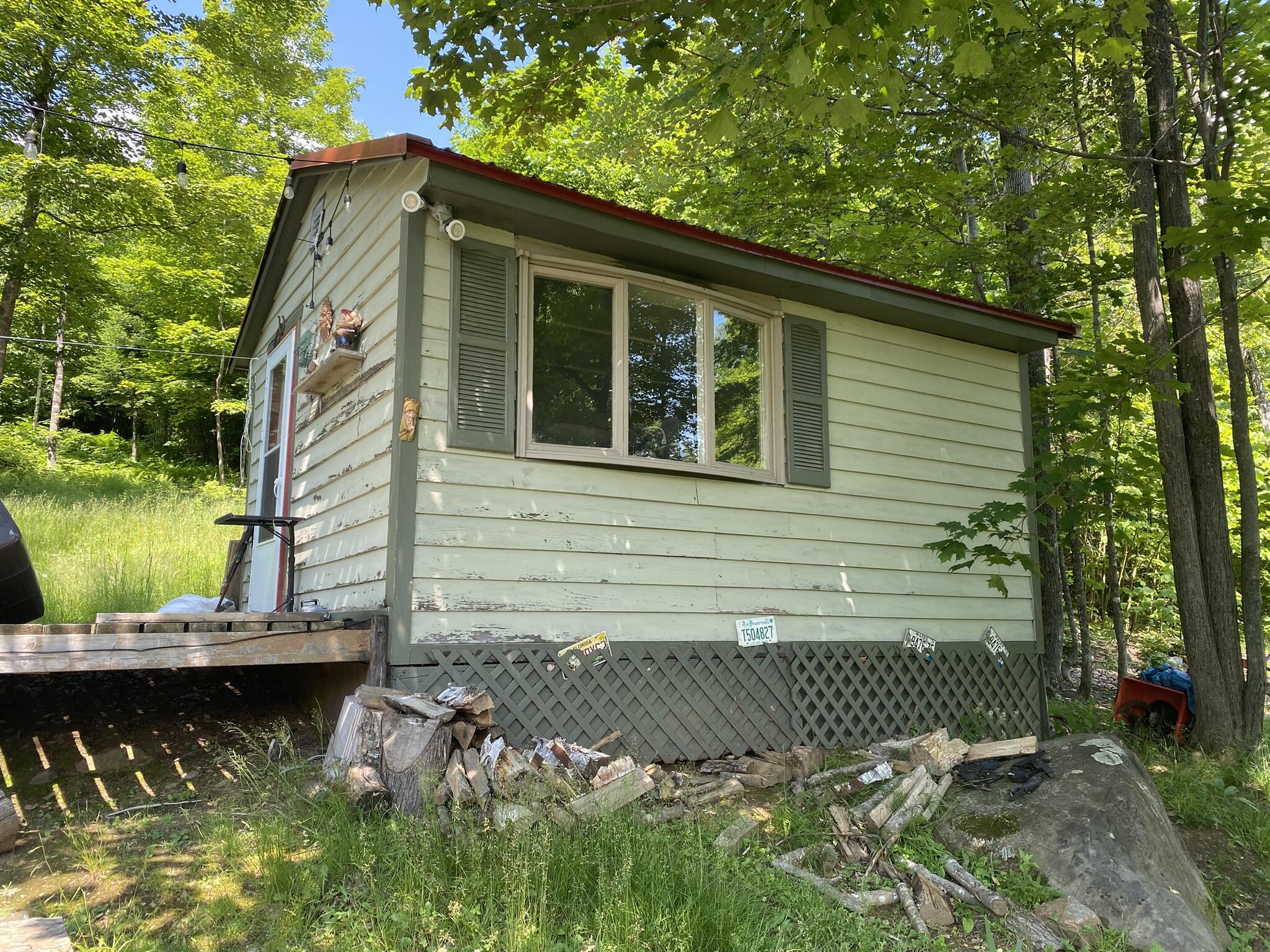 191 Weld Road Phillips, ME 04966 - Photo 15 of 24 Shed and porch