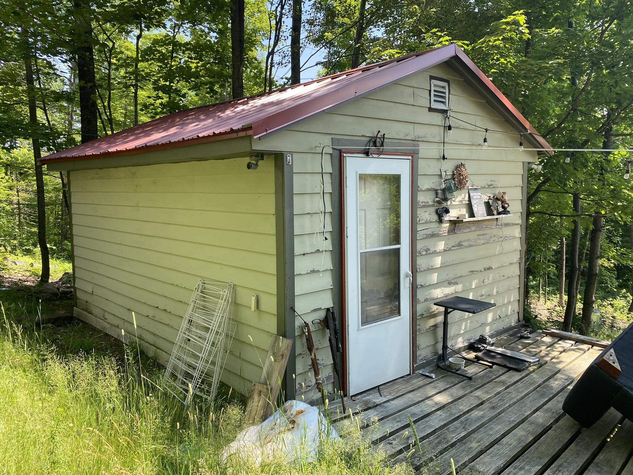 191 Weld Road Phillips, ME 04966 - Photo 19 of 24 Shed and porch