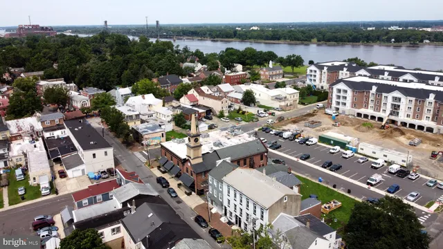 an aerial view of a house with a lake view