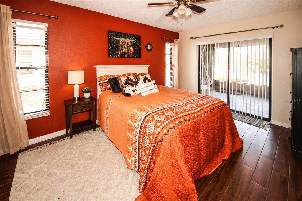 13277 Delbarton Street Spring Hill, FL 34609 - Photo 8 of 22 a bedroom with a bed and a window