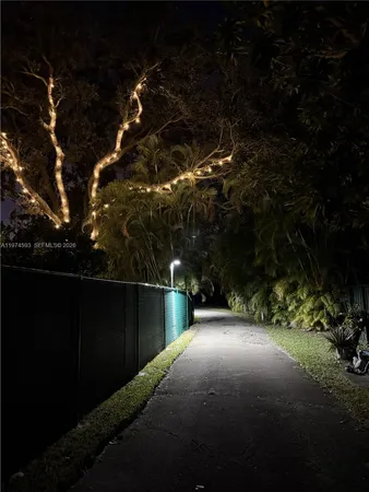 a view of balcony and yard