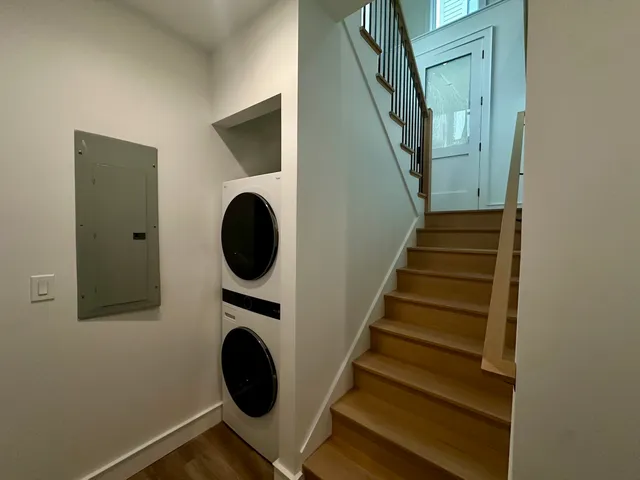 a view of entryway with wooden floor