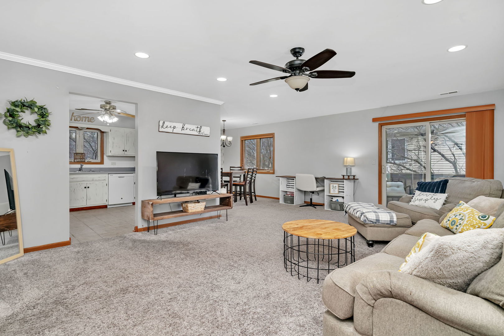 2670 Jodee Drive, Unit B Joliet, IL 60436 - Photo 3 of 23 a living room with furniture and a flat screen tv