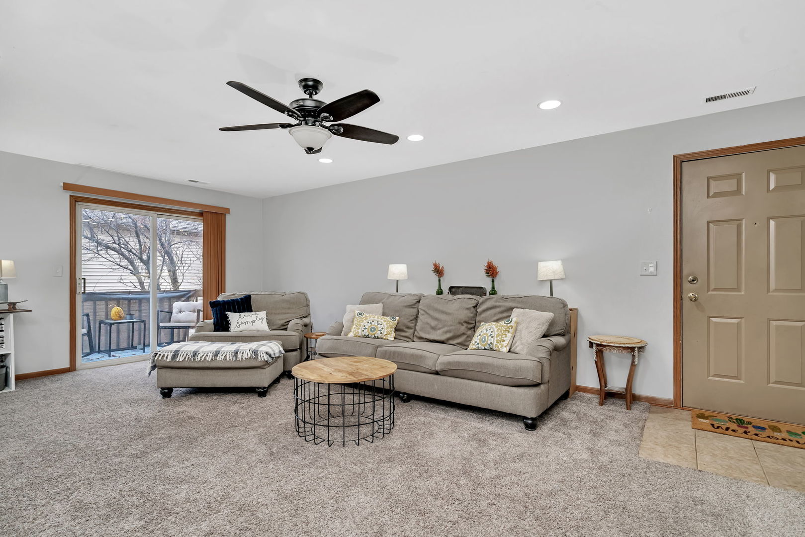 2670 Jodee Drive, Unit B Joliet, IL 60436 - Photo 6 of 23 a living room with furniture and a window