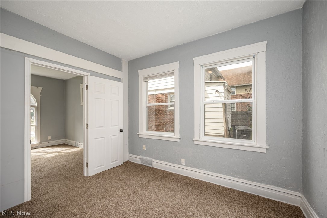 1603 Hampton Road Akron, OH 44305 - Photo 12 of 50 Unfurnished room with carpet floors and baseboards