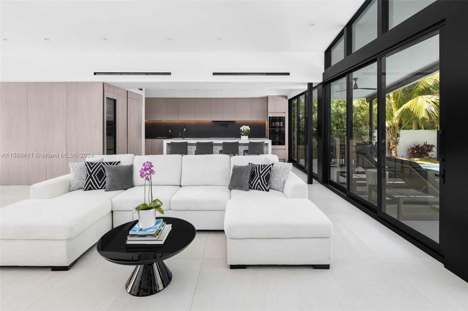 5225 La Gorce Drive Miami Beach, FL 33140 - Photo 17 of 64 a living room with furniture and a large window