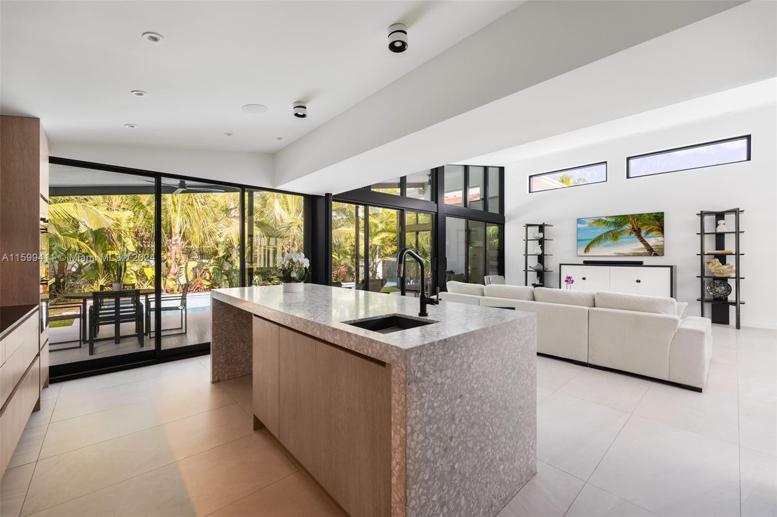 5225 La Gorce Drive Miami Beach, FL 33140 - Photo 21 of 64 a large white kitchen with a large window