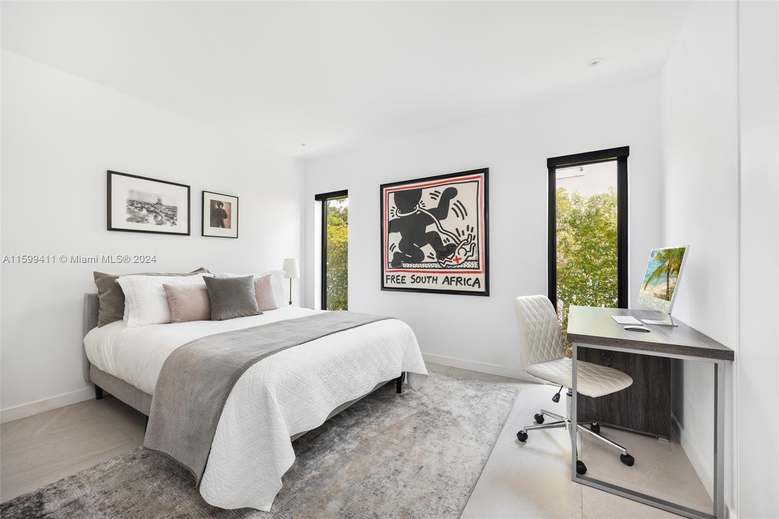 5225 La Gorce Drive Miami Beach, FL 33140 - Photo 33 of 64 a bed room with a bed and a chair