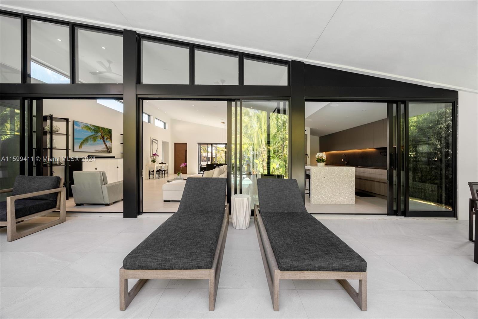 5225 La Gorce Drive Miami Beach, FL 33140 - Photo 44 of 64 a room with pool table and glass door