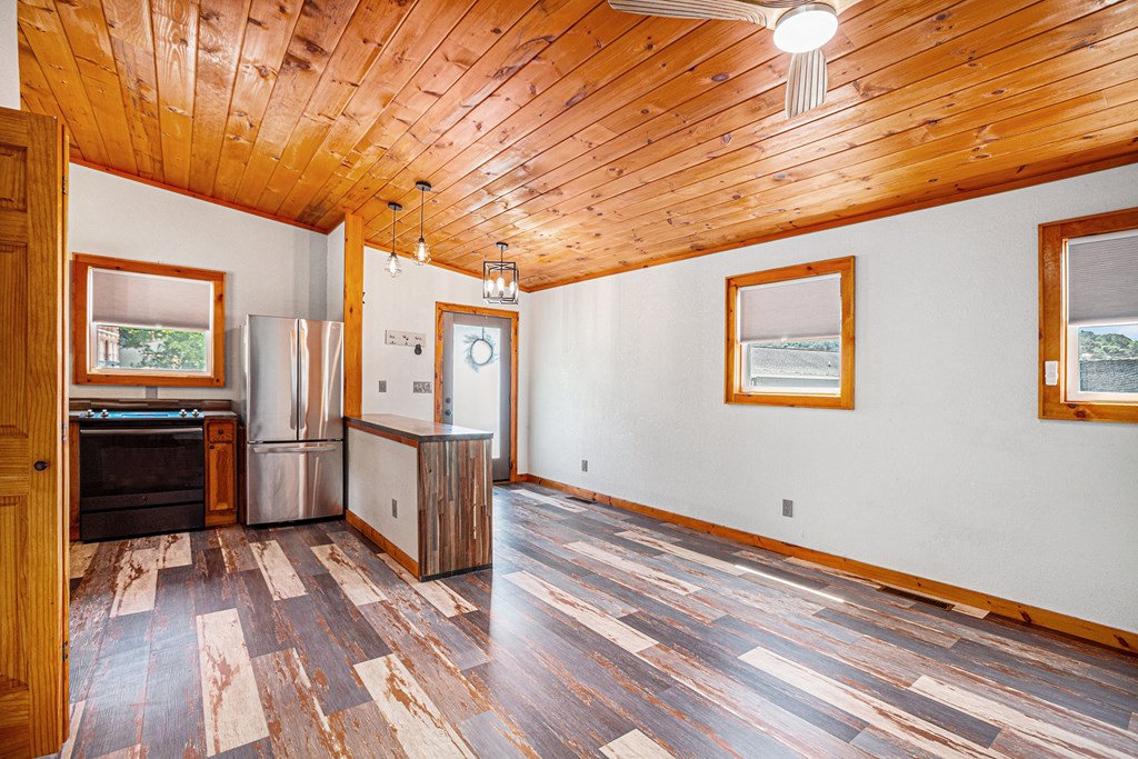 177 Main Street Copperhill, TN 37317 - Photo 4 of 26 a view of a livingroom with wooden floor