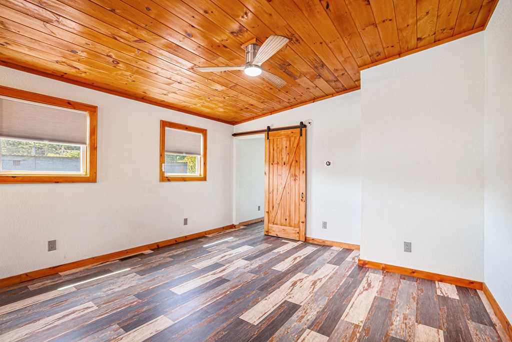 177 Main Street Copperhill, TN 37317 - Photo 8 of 26 a view of empty room with wooden floor