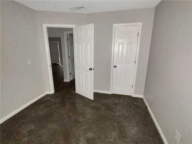 an empty room with closet