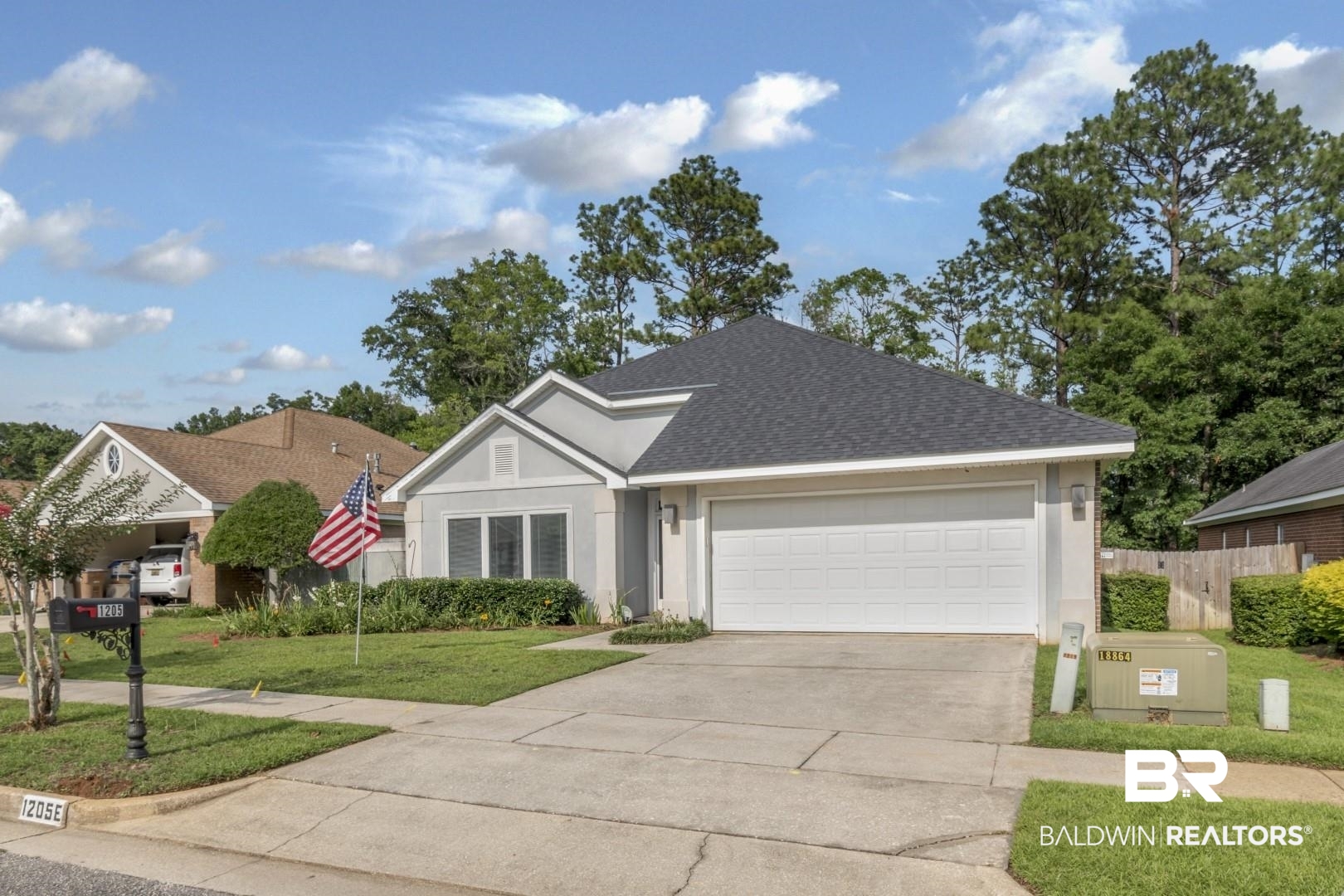 1205 Hillcrest Crossing East Mobile, AL 36695 - Photo 2 of 40 View of front of property with a garage and a front yard