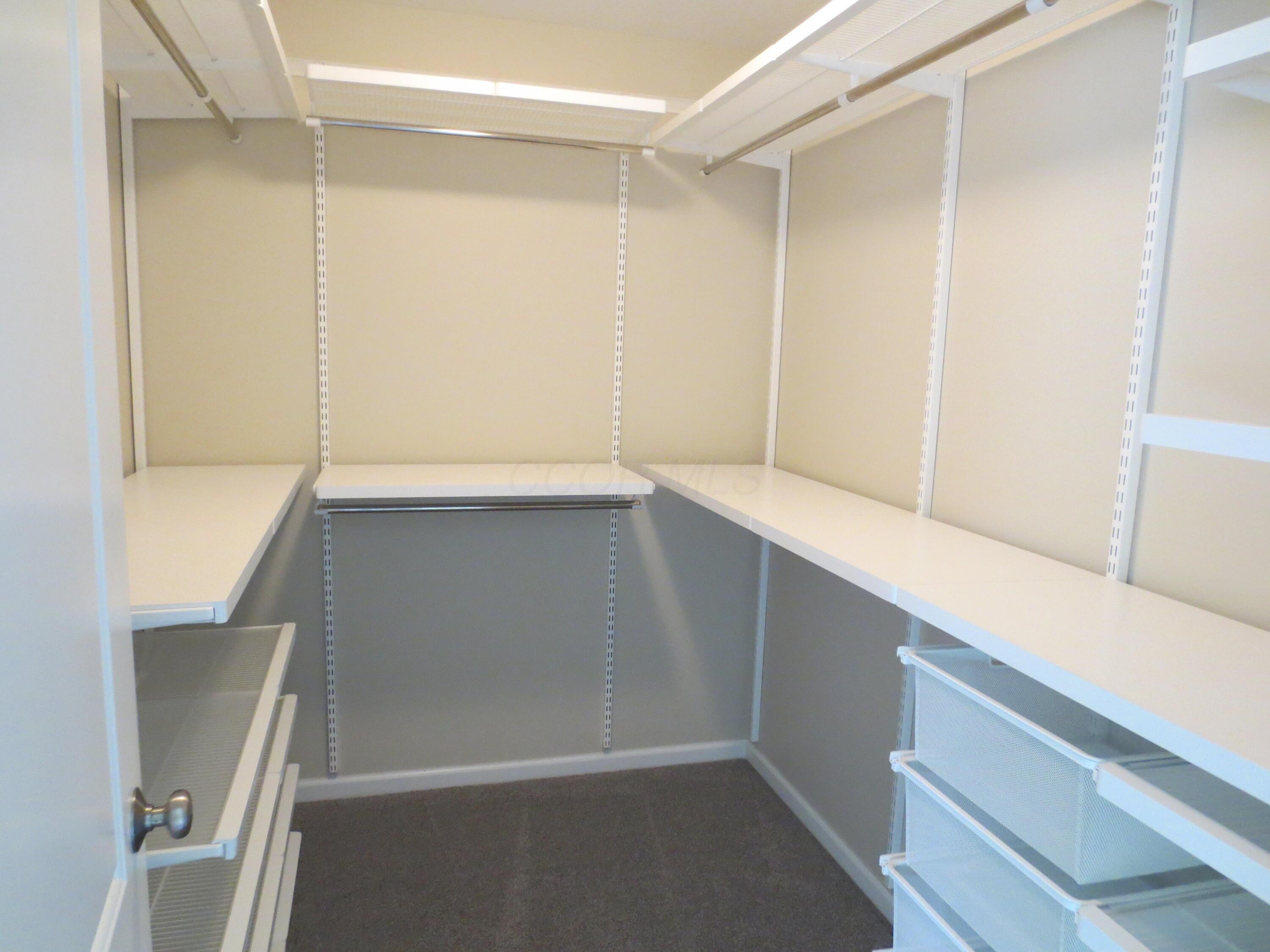 101 Merriston Circle Delaware, OH 43015 - Photo 14 of 34 Owner suite walk in closet with ELFA closet organaizer