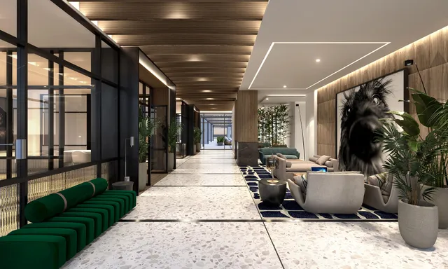 a living room with furniture and a potted plant