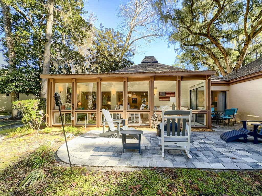3211 Sea Marsh Road Fernandina Beach, FL 32034 - Photo 26 of 30 a view of a house with backyard porch and sitting area