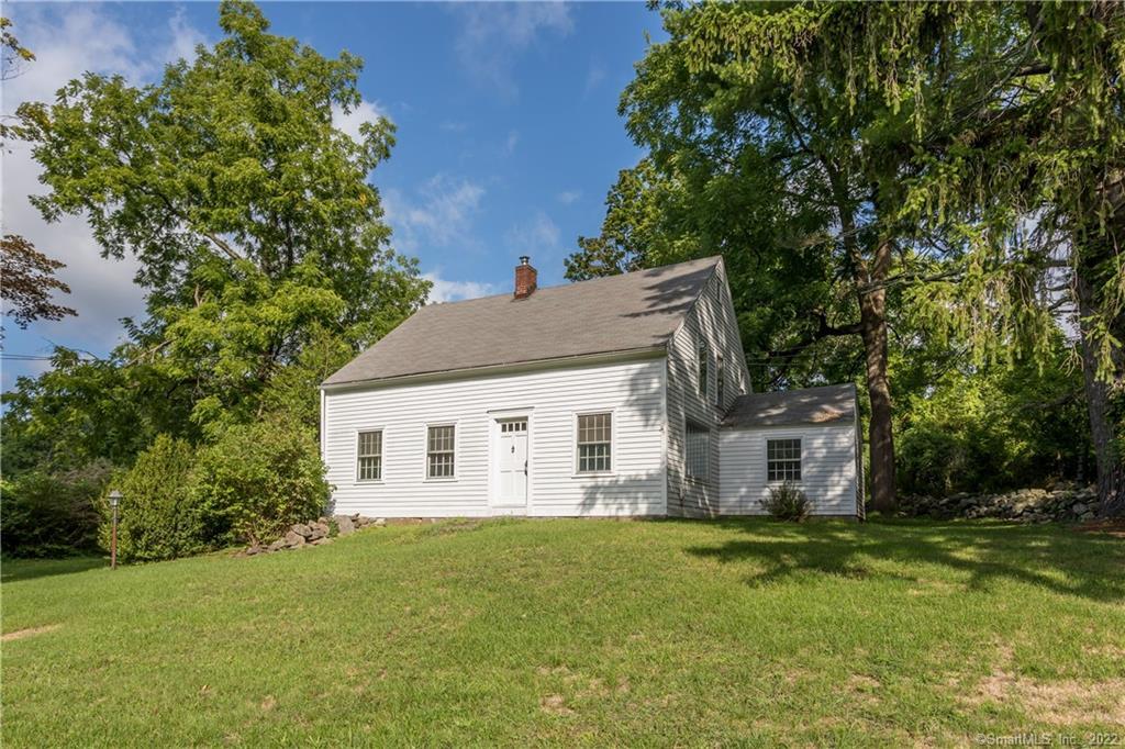 77 Segar Mountain Road Kent, CT 06757 - Photo 1 of 1 a view of a house with a backyard