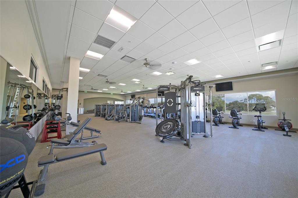 385 North Point Road, Unit 402 Osprey, FL 34229 - Photo 56 of 62 a view of a room with gym equipment