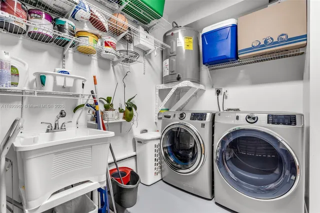 a utility room with dryer and washer
