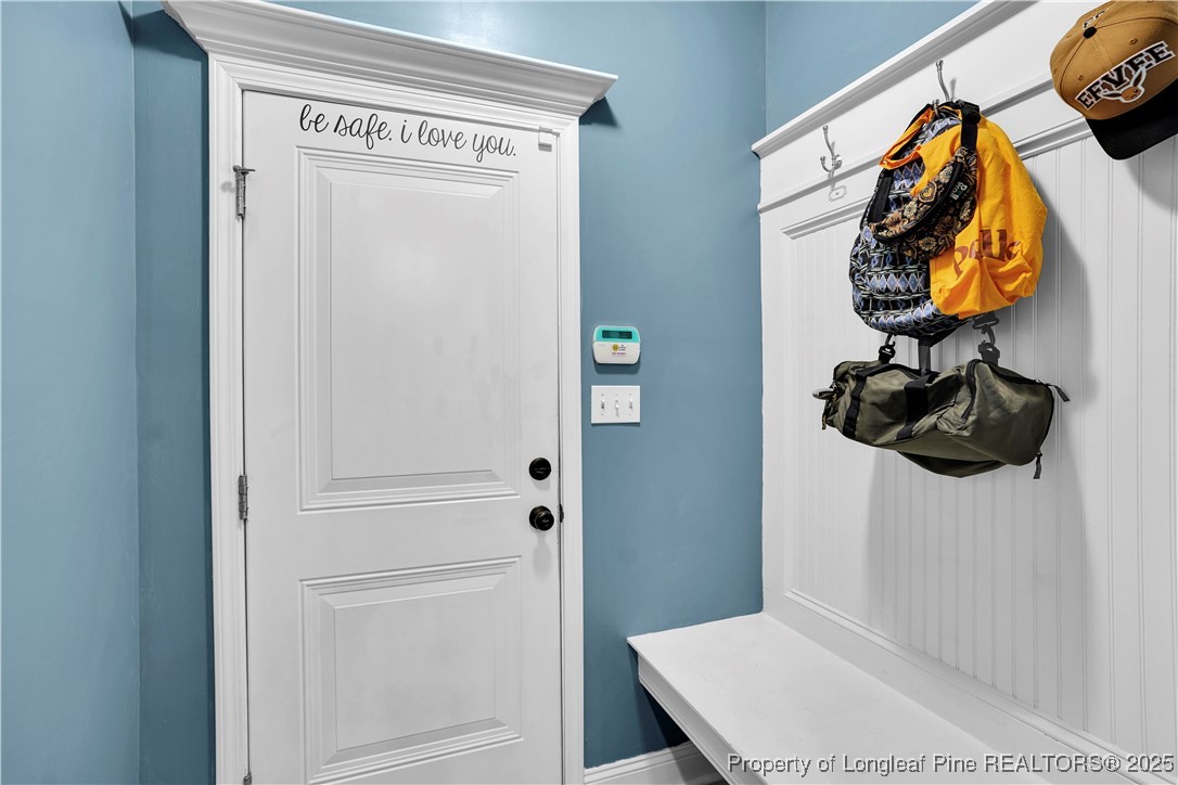 831 Thrush Drive Vass, NC 28394 - Photo 16 of 35 a bathroom with a sink and a mirror