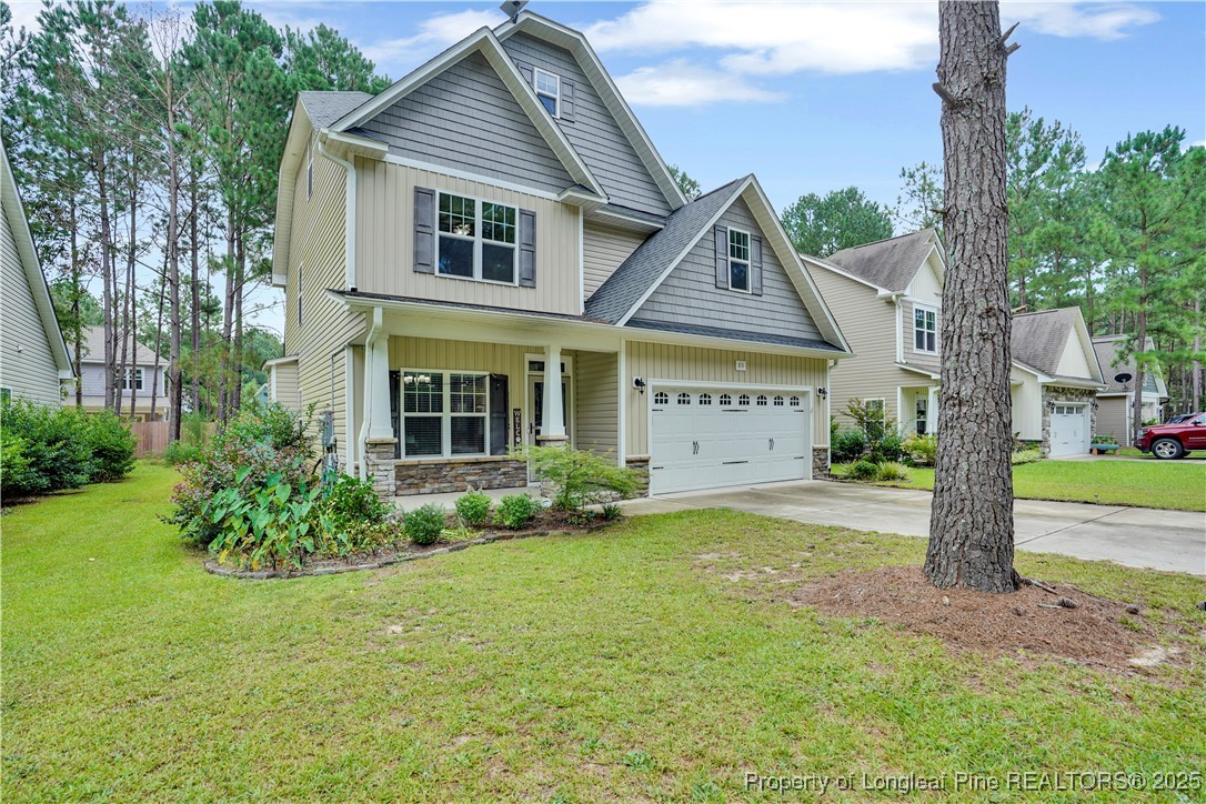 831 Thrush Drive Vass, NC 28394 - Photo 2 of 35 a view of a house with garden