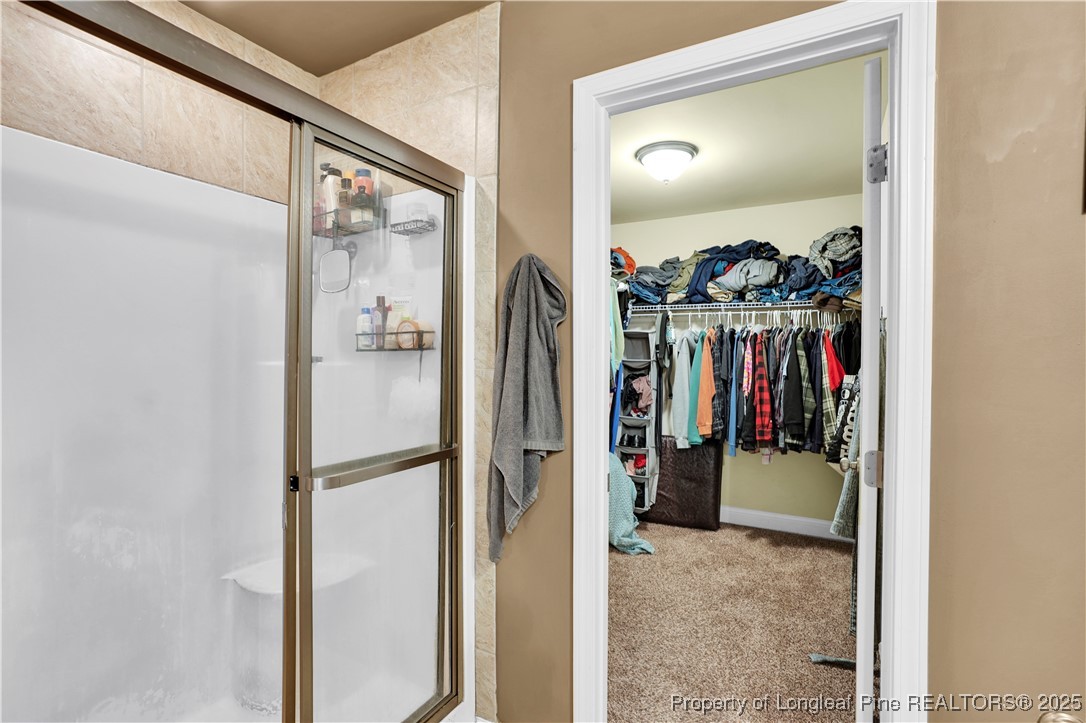 831 Thrush Drive Vass, NC 28394 - Photo 22 of 35 a view of a walk in closet