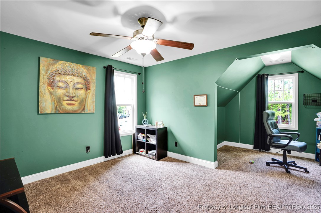 831 Thrush Drive Vass, NC 28394 - Photo 28 of 35 a view of a room with gym equipment