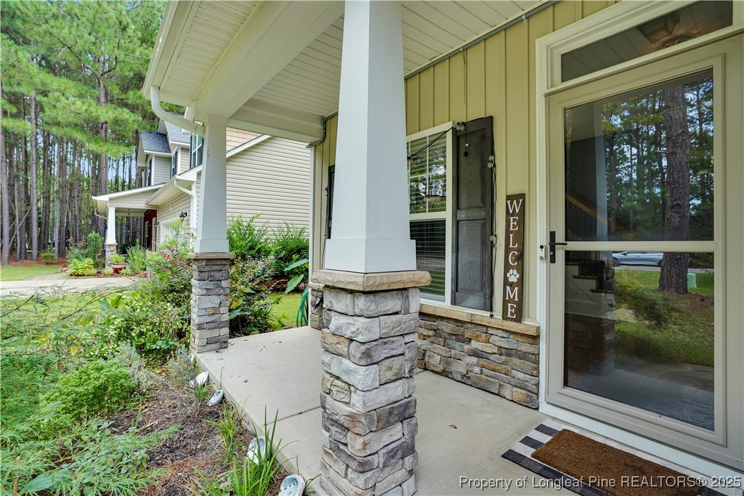831 Thrush Drive Vass, NC 28394 - Photo 4 of 35 a front view of a house with garden