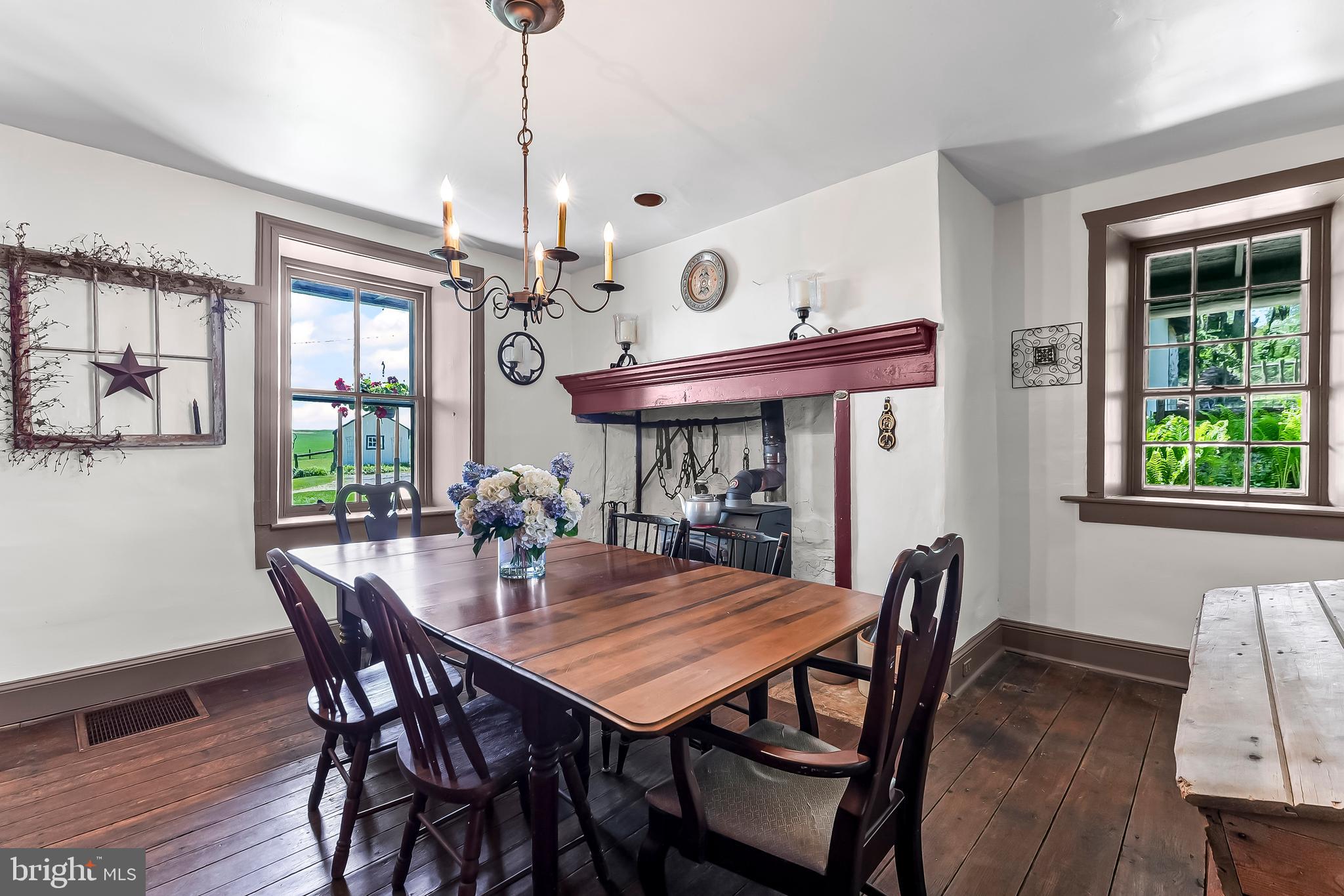 3058 Bailey Crossroads Road Atglen, PA 19310 - Photo 11 of 41 a view of a dining room with furniture window and wooden floor
