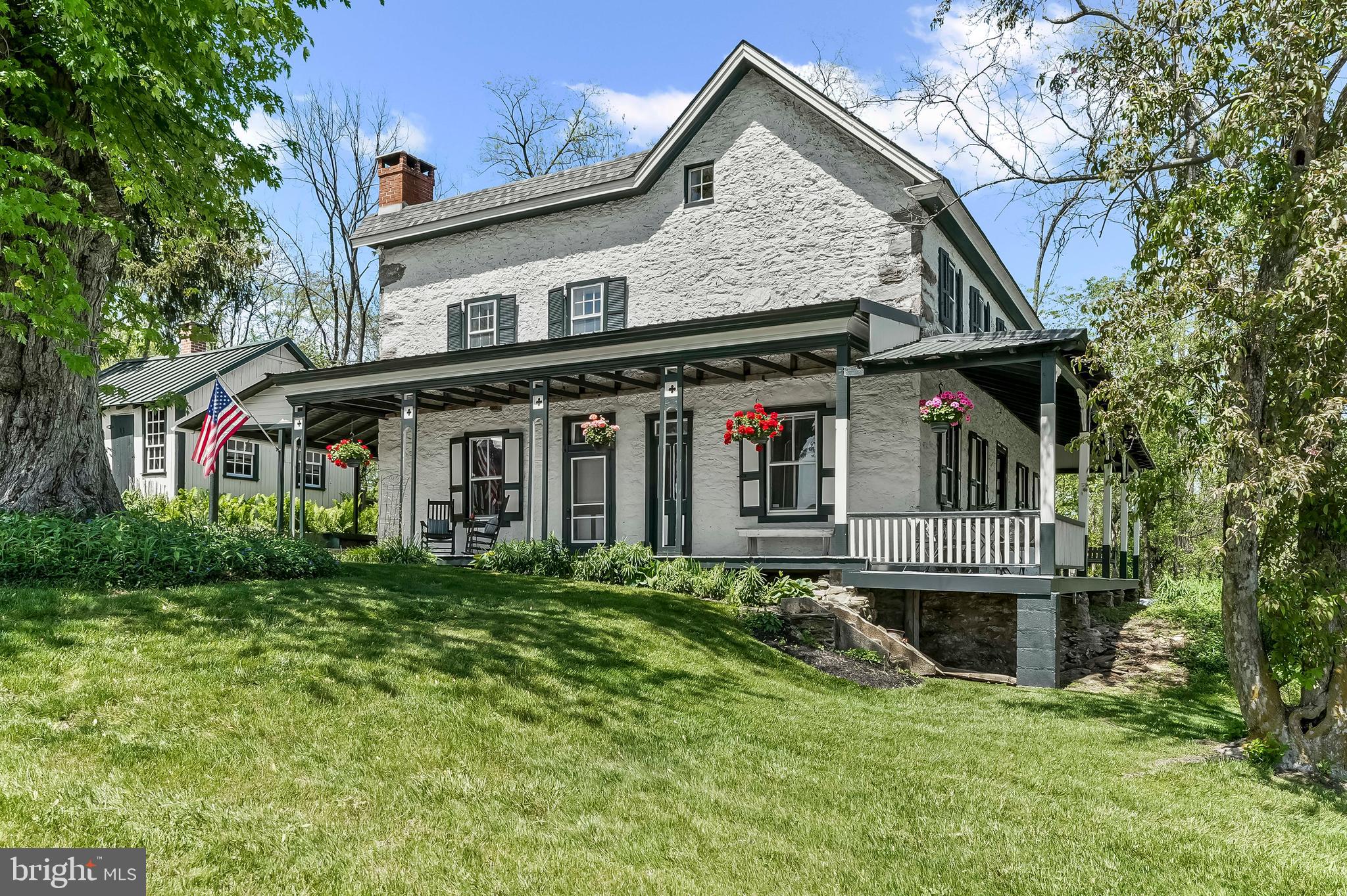 3058 Bailey Crossroads Road Atglen, PA 19310 - Photo 27 of 41 a front view of a house with garden