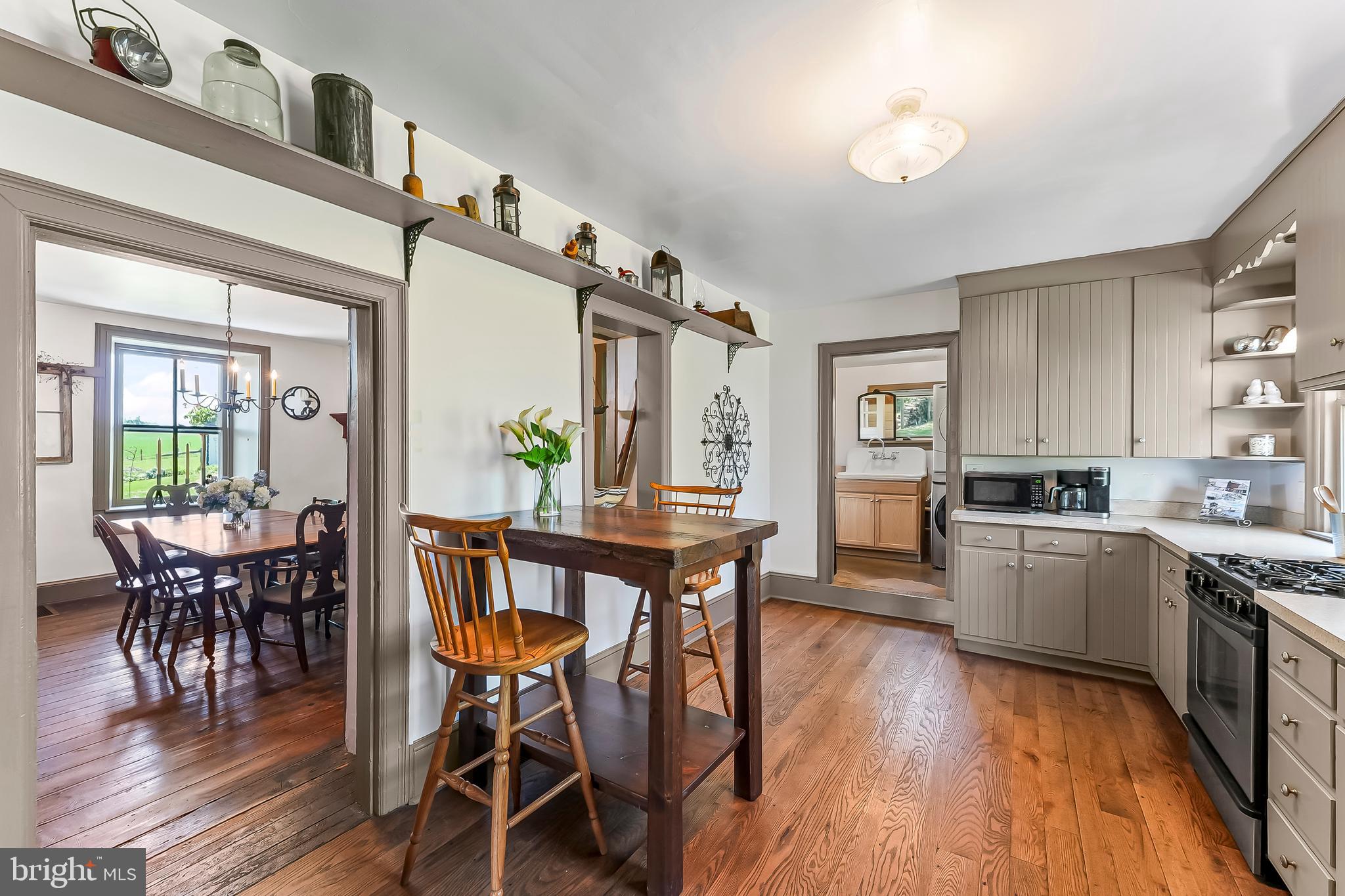 3058 Bailey Crossroads Road Atglen, PA 19310 - Photo 10 of 41 a view of a dining room with furniture and wooden floor