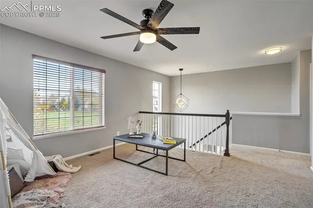 a workspace with furniture and window