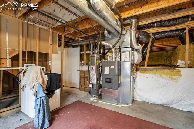 an aerial view of a house with a swimming pool
