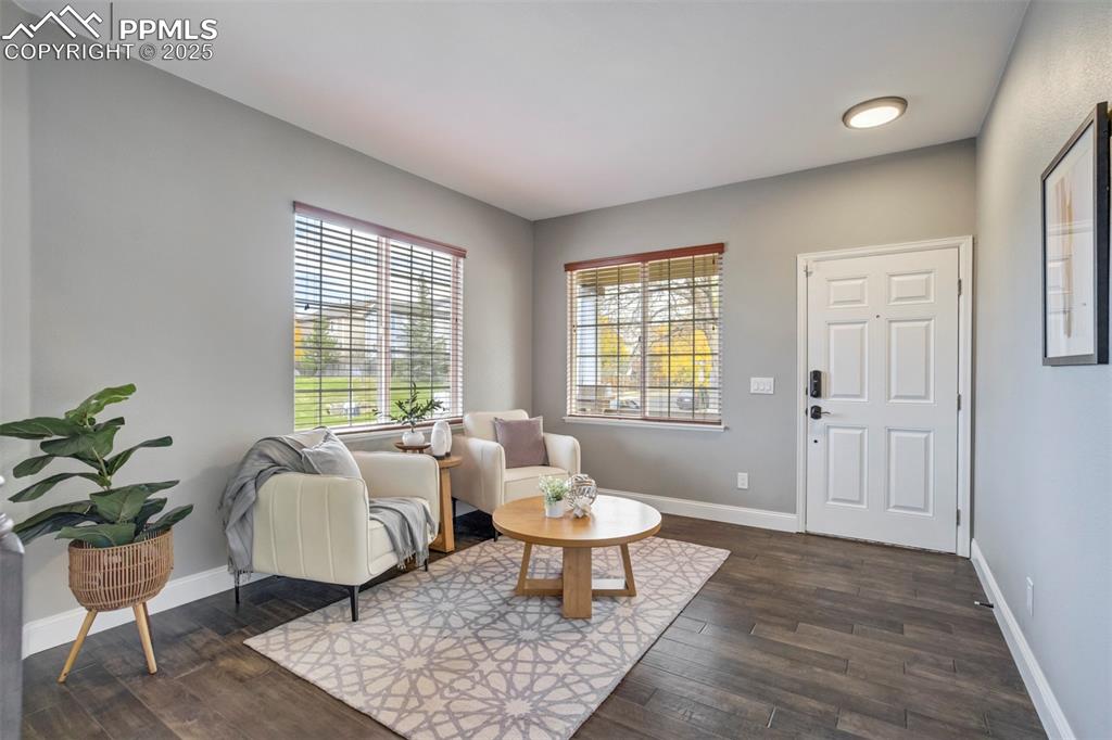 3140 River Valley View Colorado Springs, CO 80922 - Photo 4 of 49 a living room with furniture and a window