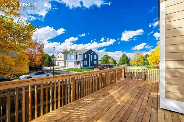 aerial view of a house with wooden fence