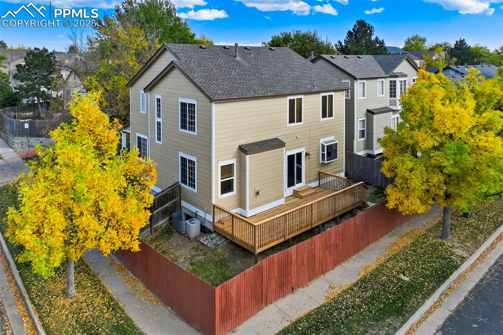3140 River Valley View Colorado Springs, CO 80922 - Photo 45 of 49 aerial view of a house with wooden fence
