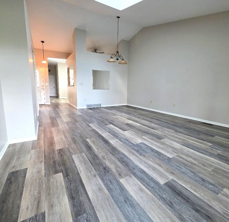 176 Long Rapids Road Alpena, MI 49707 - Photo 9 of 38 Living Room w/dining space