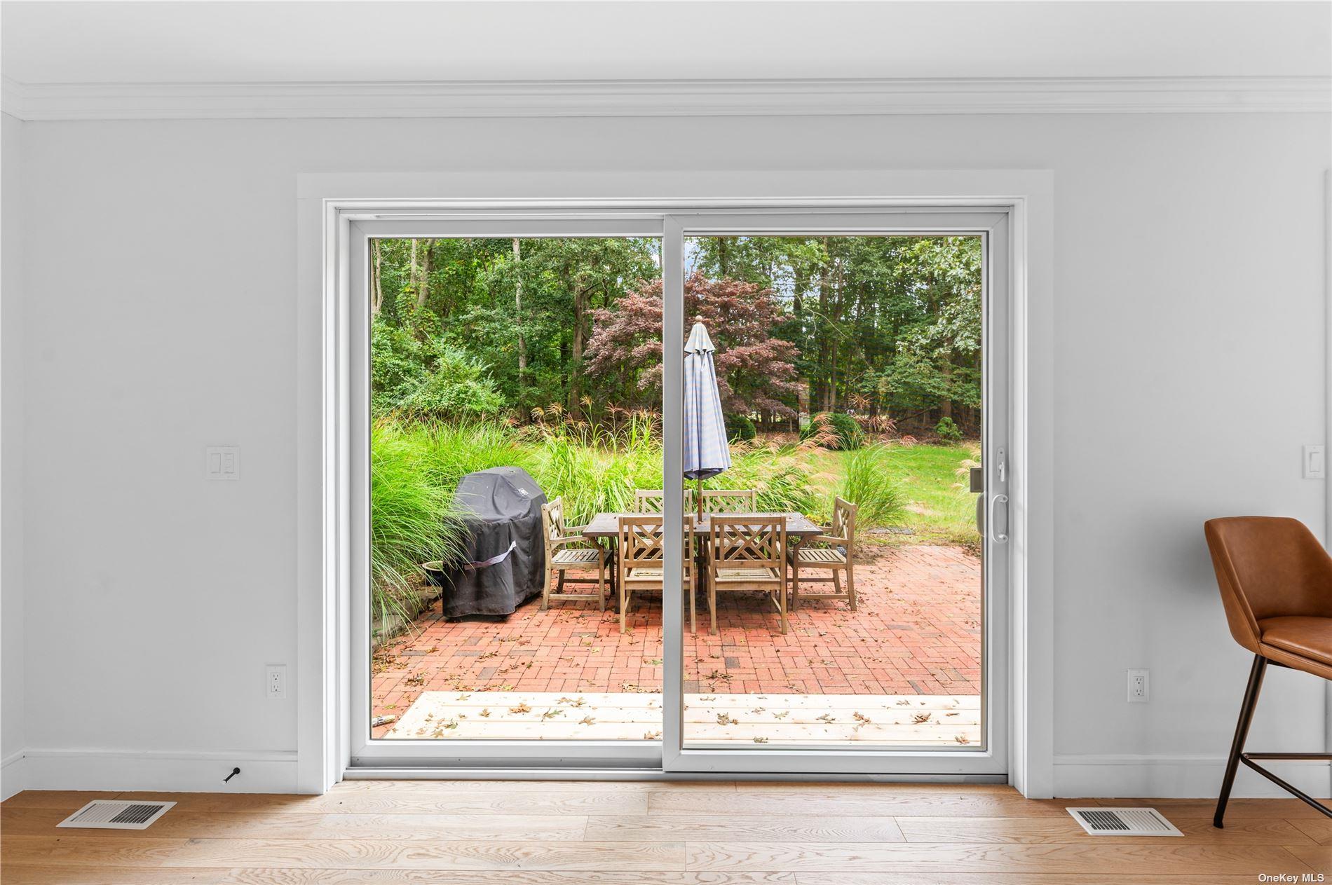 870 Stars Road East Marion, NY 11939 - Photo 11 of 23 a view of a room with a table and chairs