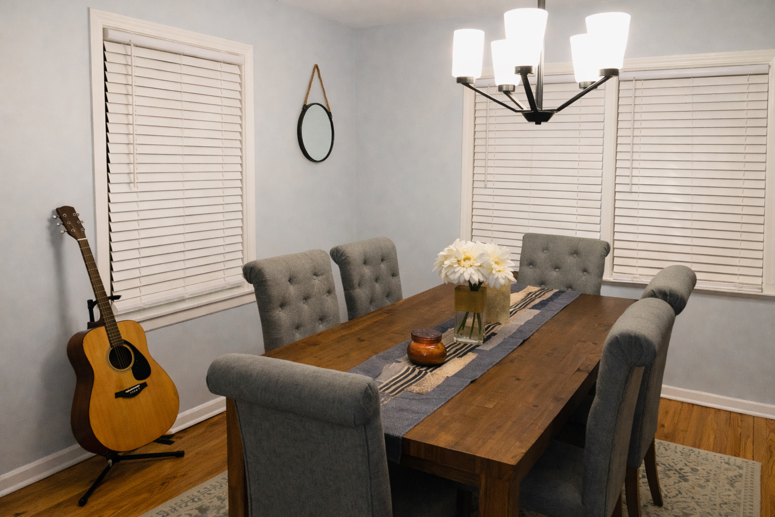 9044 South Merrill Avenue Chicago, IL 60617 - Photo 16 of 46 a dining room with furniture and wooden floor