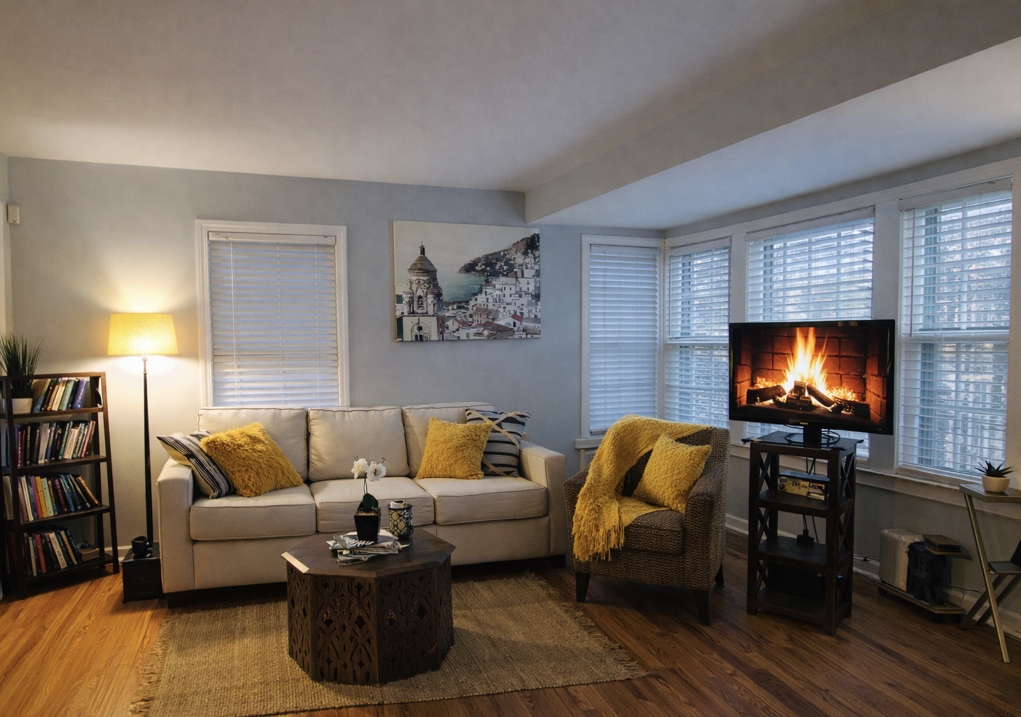 9044 South Merrill Avenue Chicago, IL 60617 - Photo 19 of 46 a living room with furniture and a flat screen tv
