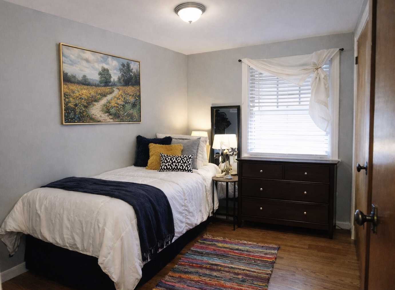 9044 South Merrill Avenue Chicago, IL 60617 - Photo 31 of 46 a bedroom with a bed and a window