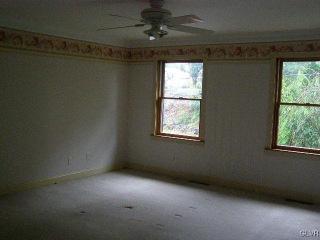 3448 Quarry Street Whitehall, PA 18052 - Photo 12 of 17 en empty room with a window