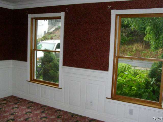 3448 Quarry Street Whitehall, PA 18052 - Photo 3 of 17 a view of an empty room with a window