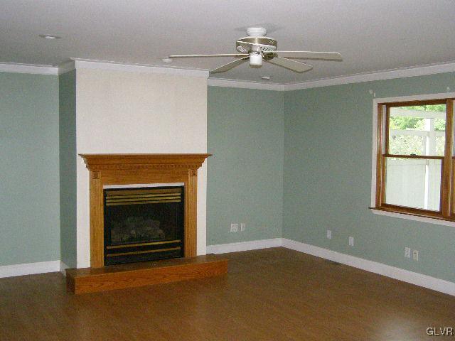 3448 Quarry Street Whitehall, PA 18052 - Photo 7 of 17 a view of an empty room with a fireplace