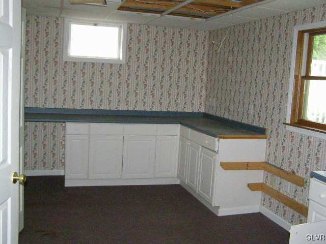 3448 Quarry Street Whitehall, PA 18052 - Photo 10 of 17 a view of an empty room with a window
