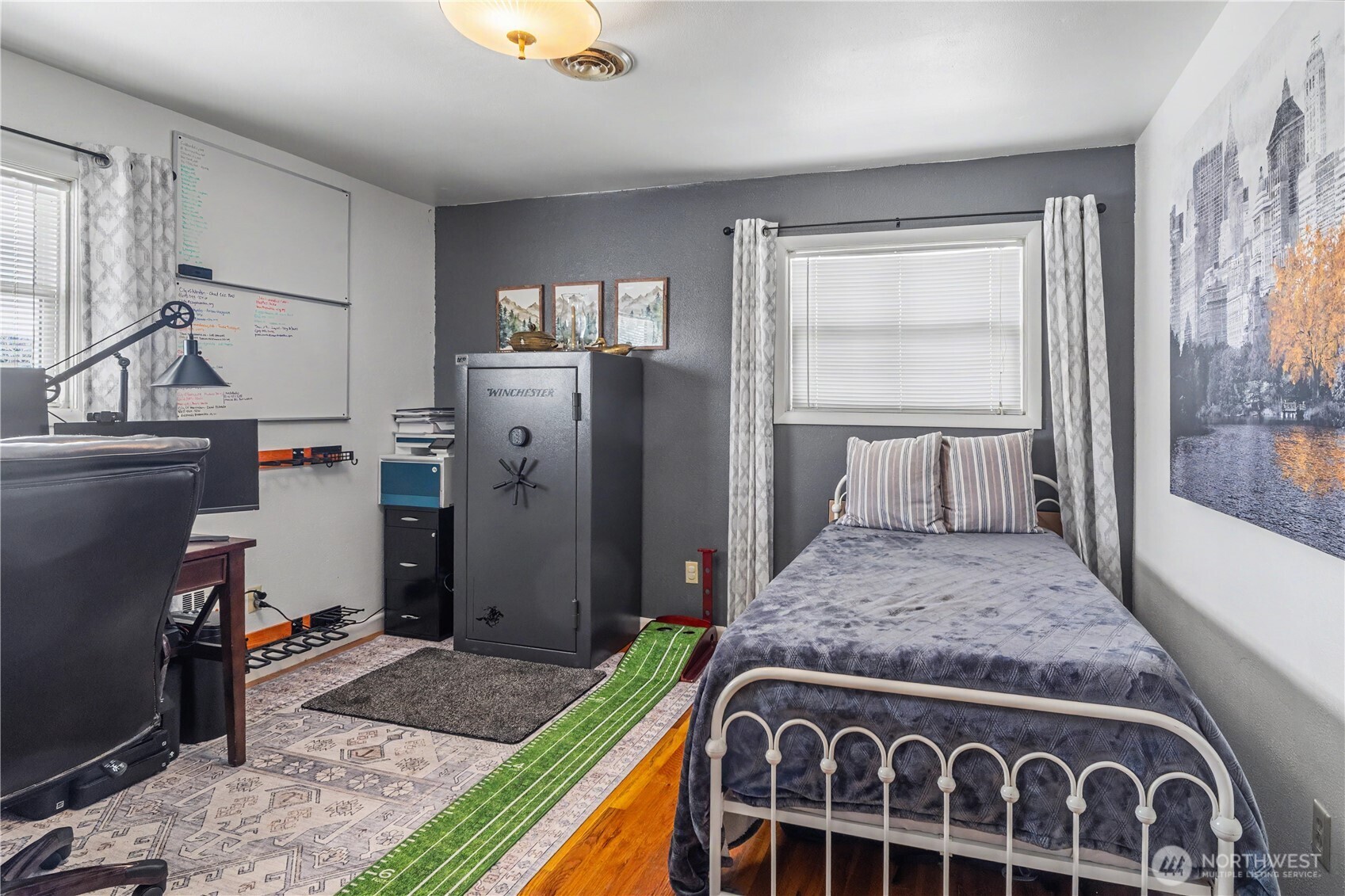 1104 East Dobson Road Odessa, WA 99159 - Photo 14 of 40 a bedroom with a bed and wooden floor