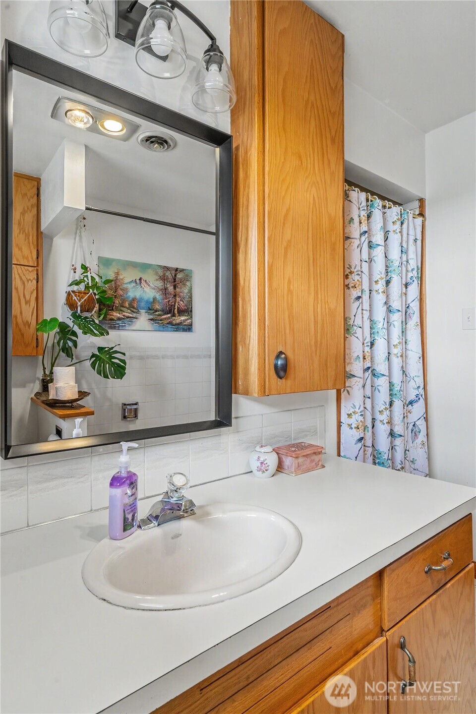 1104 East Dobson Road Odessa, WA 99159 - Photo 16 of 40 a bathroom with a sink and a mirror